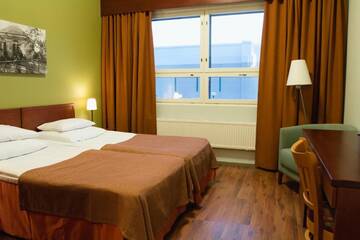 Фото номера Стандартный двухместный номер с 2 отдельными кроватями Отель Sport &amp; Spa Hotel Vesileppis г. Леппявирта 7