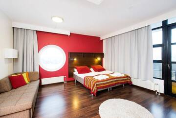 Фото номера Стандартный номер с 2 односпальными кроватями и диваном Отель Sport &amp; Spa Hotel Vesileppis г. Леппявирта 4