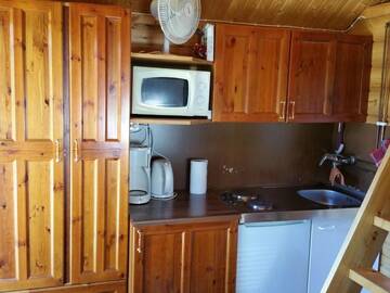 Фото номера Небольшой коттедж с видом на озеро Кемпинги Mansikkaharju Holiday Camp г. Леппявирта 7