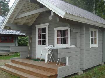Фото номера Небольшой коттедж с видом на озеро Кемпинги Mansikkaharju Holiday Camp г. Леппявирта 6