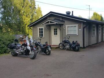 Фото номера Коттедж с 2 спальнями Кемпинги Mansikkaharju Holiday Camp г. Леппявирта 5
