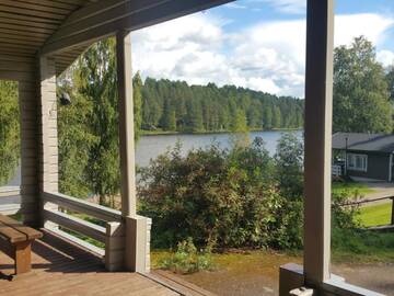 Фото номера Коттедж с 2 спальнями Кемпинги Mansikkaharju Holiday Camp г. Леппявирта 7