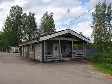 Фото номера Коттедж с 2 спальнями Кемпинги Mansikkaharju Holiday Camp г. Леппявирта 8