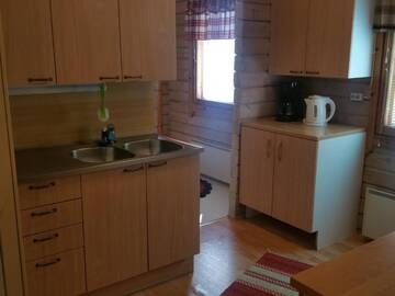 Фото номера Коттедж с 2 спальнями Кемпинги Mansikkaharju Holiday Camp г. Леппявирта 15