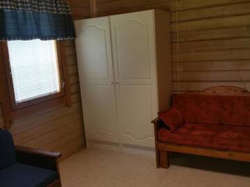 Фото номера Коттедж с 2 спальнями Кемпинги Mansikkaharju Holiday Camp г. Леппявирта 12