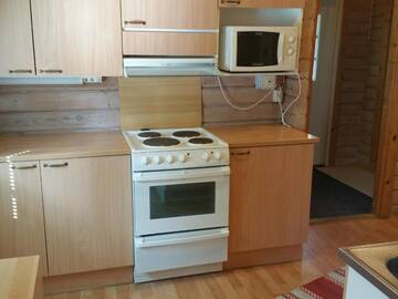 Фото номера Коттедж с 2 спальнями Кемпинги Mansikkaharju Holiday Camp г. Леппявирта 10