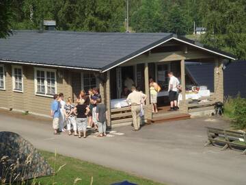 Фото номера Коттедж с 2 спальнями Кемпинги Mansikkaharju Holiday Camp г. Леппявирта 16