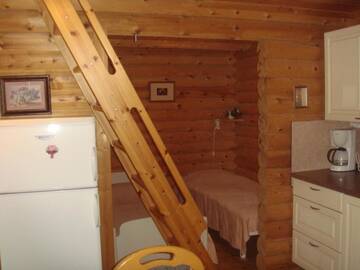 Фото номера Большой коттедж с видом на озеро Кемпинги Mansikkaharju Holiday Camp г. Леппявирта 13