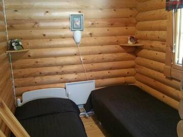Фото номера Большой коттедж с видом на озеро Кемпинги Mansikkaharju Holiday Camp г. Леппявирта 17