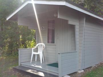 Фото номера Коттедж &quot;Эконом&quot; с общей ванной комнатой Кемпинги Mansikkaharju Holiday Camp г. Леппявирта 4
