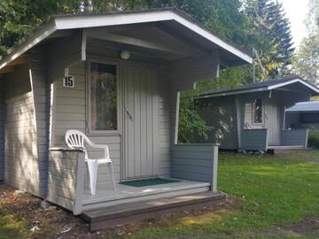 Фото номера Коттедж &quot;Эконом&quot; с общей ванной комнатой Кемпинги Mansikkaharju Holiday Camp г. Леппявирта 2