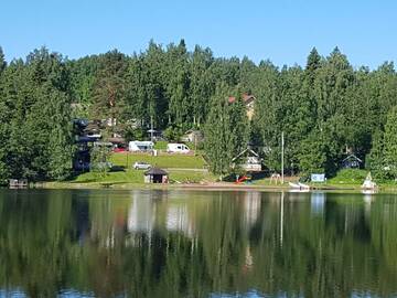 Фото номера Коттедж с общей ванной комнатой (4 взрослых) Кемпинги Mansikkaharju Holiday Camp г. Леппявирта 14