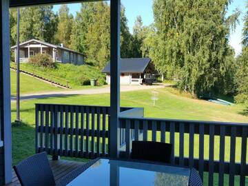 Фото номера Вилла с 1 спальней и сауной Кемпинги Mansikkaharju Holiday Camp г. Леппявирта 6