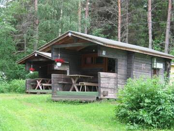 Фото номера Коттедж с общей ванной комнатой (для 2 взрослых) Кемпинги Mansikkaharju Holiday Camp г. Леппявирта 2