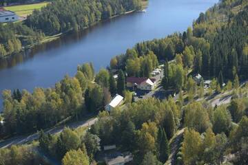 Фото номера Коттедж &quot;Эконом&quot; с общей ванной комнатой Кемпинги Mansikkaharju Holiday Camp г. Леппявирта 13