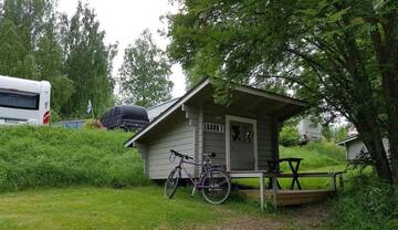 Фото номера Коттедж Laavu Кемпинги Mansikkaharju Holiday Camp г. Леппявирта 3