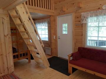 Фото номера Коттедж с видом на озеро Кемпинги Mansikkaharju Holiday Camp г. Леппявирта 7