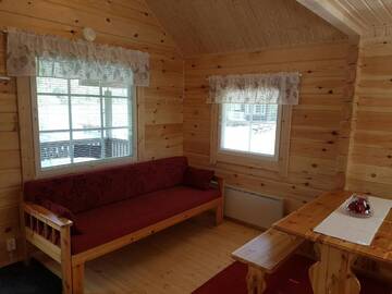 Фото номера Коттедж с видом на озеро Кемпинги Mansikkaharju Holiday Camp г. Леппявирта 6
