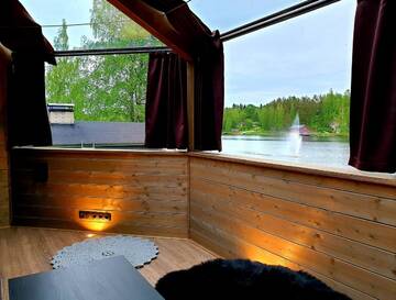 Фото номера Коттедж Iglu с видом на озеро Кемпинги Mansikkaharju Holiday Camp г. Леппявирта 6