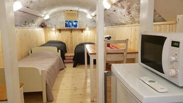 Фото номера Подземное шале Кемпинги Mansikkaharju Holiday Camp г. Леппявирта 2
