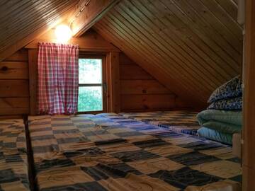 Фото номера Небольшой коттедж с видом на озеро Кемпинги Mansikkaharju Holiday Camp г. Леппявирта 17