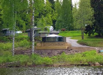 Фото номера Коттедж Iglu с видом на озеро Кемпинги Mansikkaharju Holiday Camp г. Леппявирта 13