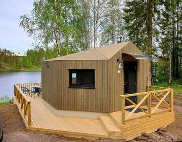 Фото номера Коттедж Iglu с видом на озеро Кемпинги Mansikkaharju Holiday Camp г. Леппявирта 10