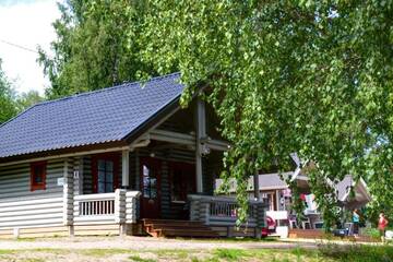 Фото номера Большой коттедж с видом на озеро Кемпинги Mansikkaharju Holiday Camp г. Леппявирта 2