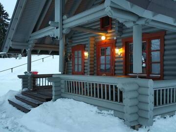 Фото номера Большой коттедж с видом на озеро Кемпинги Mansikkaharju Holiday Camp г. Леппявирта 3