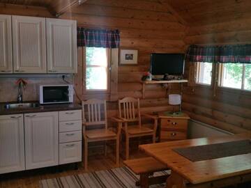 Фото номера Большой коттедж с видом на озеро Кемпинги Mansikkaharju Holiday Camp г. Леппявирта 4